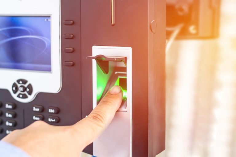 Hand a man Finger scan on machine Security concept and safety